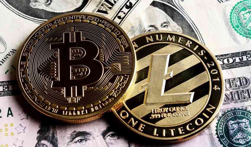 online gambling sites use zelle and qb direct for easy crypto deposits bitcoin and litecoin tokens sitting atop cash bills